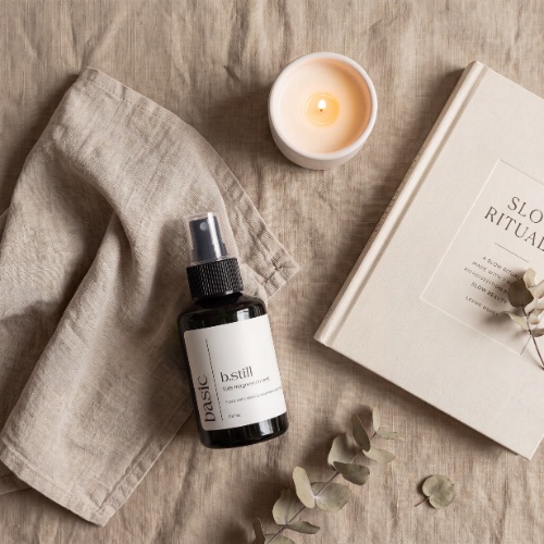b.still kids magnesium mist styled with bedtime routine props