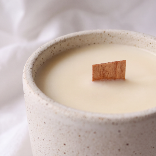 Close-up of wooden wick on b.light Haven soy candle